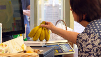 Bananas getting weighed in Church Fenton Community Shop