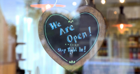 Branded 'Opening' sign in Church Fenton Community Shop