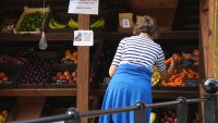 Customer buying fresh veg at Church Fenton Community Shop